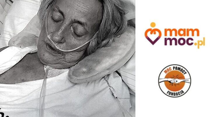 Starsza kobieta w szpitalnym łóżku z maską tlenu.